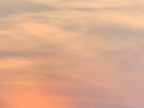 Pastel Sunset Cloudscape with Warm Evening Tones over Jakarta Indonesia Stock Photos