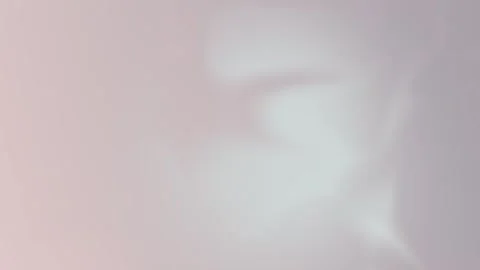 Pastel swirl gradient background: soft pinks and whites, seamless loop 4K. Stockbeeldmateriaal 309956735