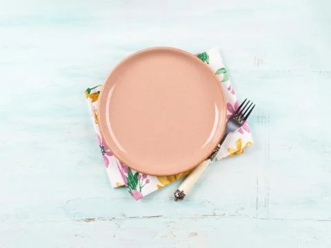 Pastel table setting on turquoise background Stock Photos