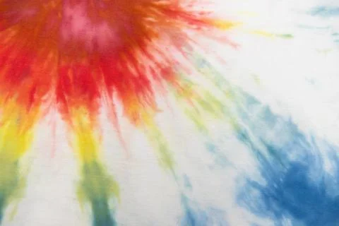 Pastel tie dye, a handmade pattern on a cotton t-shirt. Close-up, top view. D Stock Photos