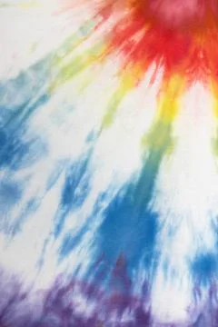 Pastel tie dye, a handmade pattern on a cotton t-shirt. Close-up, top view. D Stock Photos