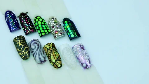 Pastes patterns with manicure of nails templates Stock Footage 76893860