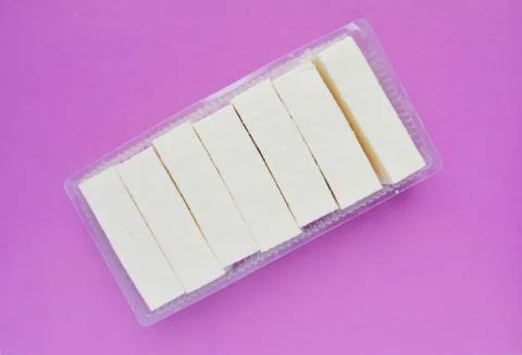 Pastille on pink background with copyspace. Flat lay or top view Stock Photos