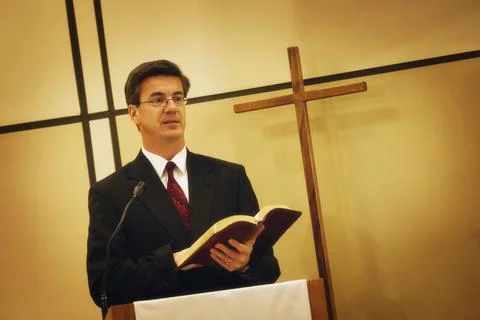 Pastor Preaching From Pulpit Stock Photos