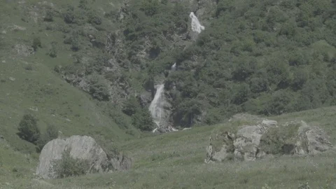 Pastoral view with waterfall Video stock 79537389