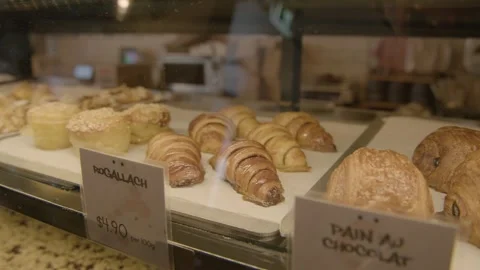 Pastries Arranged in Bakery Display Case at Sydney Cafe, Indoor Food Counter Stock Footage 345660489
