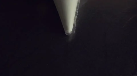 Pastry bag on black background Stock Footage 56338188