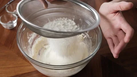 Pastry bakery chef sifting flour. Stock Footage 147974246