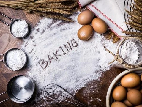 Pastry Baking Accessories Bakery Background with baking text writing on flour 스톡 사진