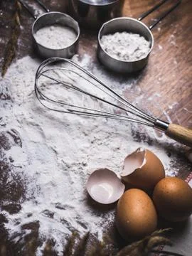 Pastry Baking Accessories Bakery Background with flour and whisk. Ingredients Stock-Fotos