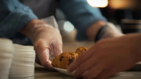 Pastry being served at a cozy cafe in the morning Stock Footage 323867978
