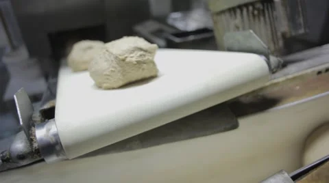 The pastry for bread production on the conveyor. Bread bakery food factory Stock-Footage 58586287