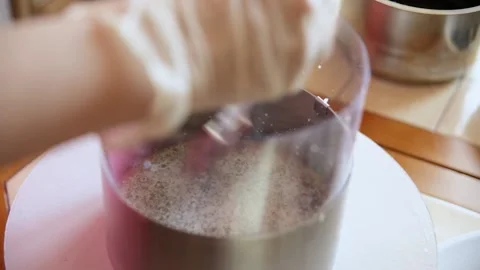 The pastry chef collects the cake, stacks the cakes in layers Stock Footage 150671313