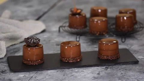 Pastry chef decorate mini mousse pastry dessert with chocolate nest. Stock Footage 152992458