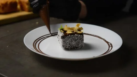 The pastry chef decorates the cake Stock Footage 247199311