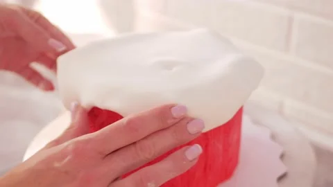 Pastry chef decorates cake, snowflakes and snow. Home production, business Video stock 165836331