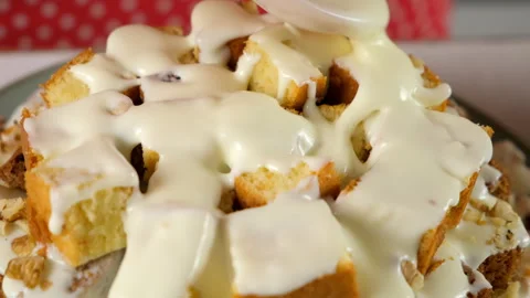 Pastry chef hands cooking pouring white cream on chocolate vanilla cake cubes. Video stock 311538560