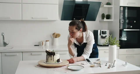Pastry chef in the kitchen makes cake. Cooking at home. Delicious and beautiful Stock Footage 167334605
