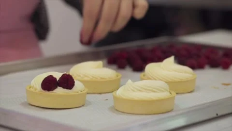 The Pastry Chef Makes Final Decorations With Raspberry Stock Footage 143717429