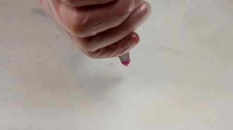 Pastry chef making Macaron or Macaroon. Squeezing the dough form cooking bag Stock Footage 62425882