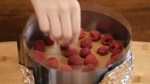 Pastry chef making raspberry cream cake with jelly, close up. Stock Footage 123799057
