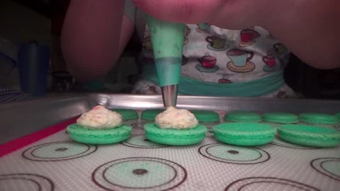 Pastry Chef piping macarons Stock Footage 168469541