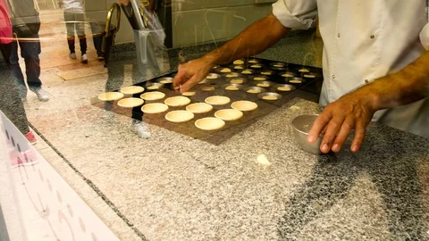 Pastry chef prepares the famous pasteis de nata, a typical dessert from Lisbon Stock Footage 108107129
