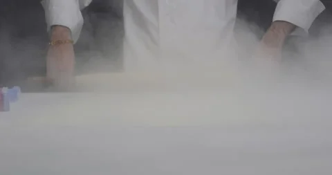 Pastry chef roll out phyllo dough with a rolling pin sprinkle flour. Turkish Stock Footage 288034113