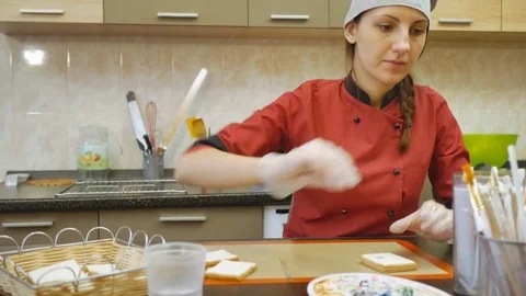 The pastry chef skillfully performs holiday order. Stock Footage 83140501