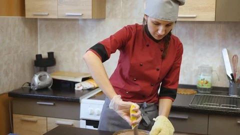 The pastry chef skillfully performs holiday order. Stock-Footage 83492301