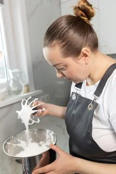 Pastry Chef Skillfully Preparing Meringue in a Modern Kitchen Stock Photos