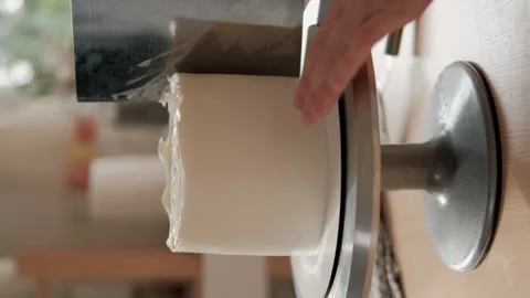 Pastry chef spreading white icing on cake, vertical video 스톡 동영상 290235073