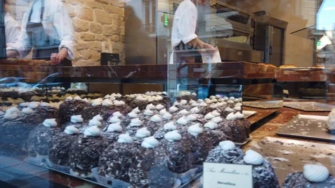 Pastry creation through window Paris France 1. Stock Footage 108646239