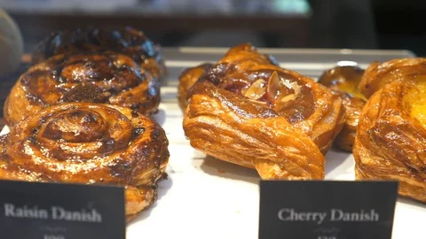Pastry On Display At Window Case In Bakery. Closeup. Stock Footage 106506739