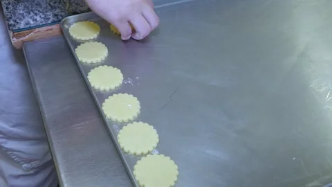 Pastry Dough Pieces Arranged on Baking Tray Stock Footage 344885055