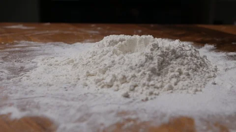 Pastry drop egg on flour. bakery products. Stock Footage 96044178