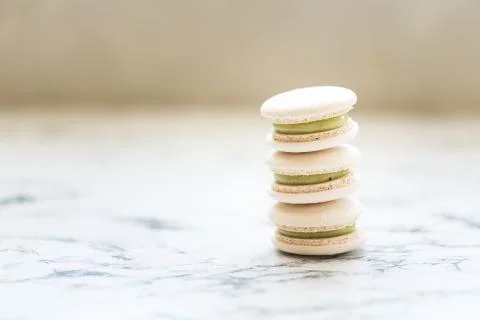 Pastry macaroons on marble background Stock Photos
