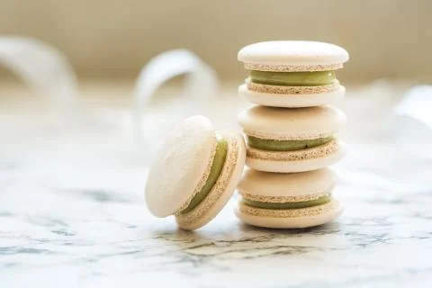 Pastry macaroons on marble background Stock Photos