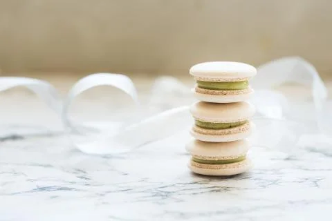 Pastry macaroons on marble background Stock Photos
