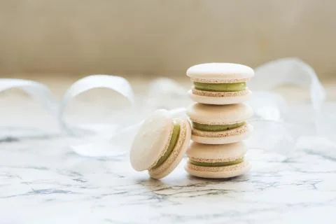 Pastry macaroons on marble background Stock Photos