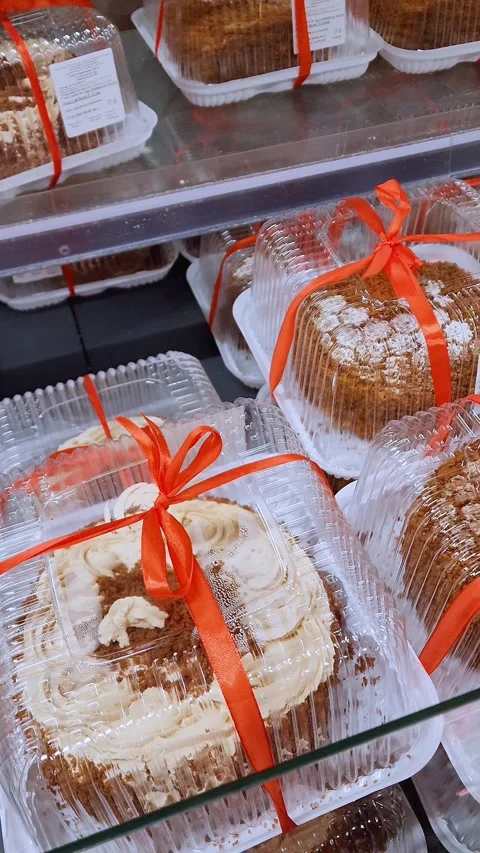 Pastry shop showcase with a selection of cream or fruit cakes. Stock Footage 337204542