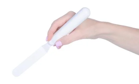 Pastry tool cake server in hand Stock Photos