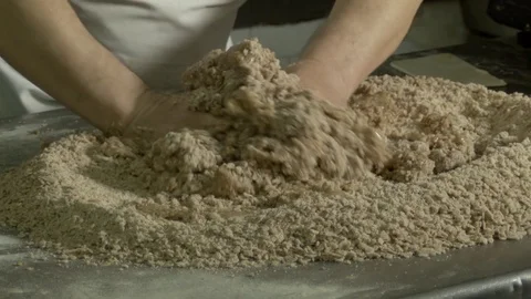 Pastry at work while preparing dough with sweet almonds Stock Footage 75870123