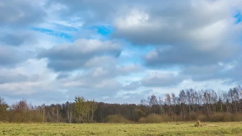 Pasture under blue sky with clouds, 4k timelapse Stock Footage 85920728