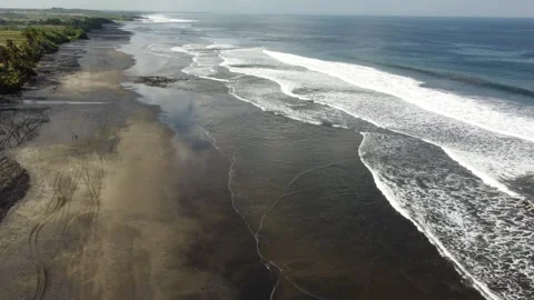 Pasut's Contrast - Aerial Flight Over the Black Sand Beach Stock Footage 248215512