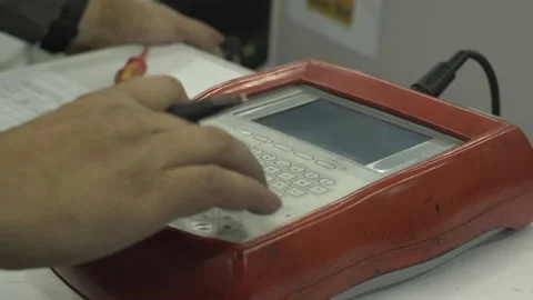 PAT Testing a washing machine. Close up of male service engineer's hands. Stock Footage 146806658