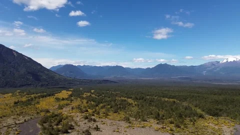 Patagonia Lava Fields with Volcano and Mountains Epic Landscape 4K Royalty Free Stock Footage 325722043