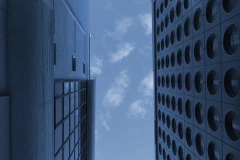 Patch of blue sky between two modern buildings abstract architectural detai.. Stock Photos
