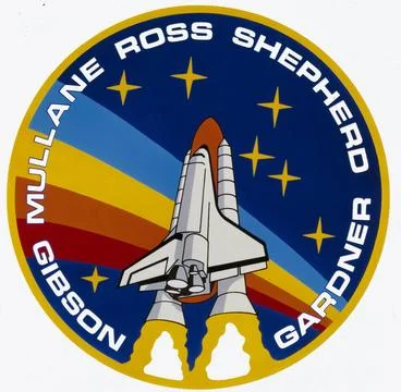 The patch depicts the Space Shuttle lifting off against the multi-colored ... Stock Photos