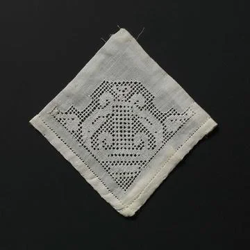 Patch with edge embroidery with symmetrical angular motif. Batist patch of... Stock Photos